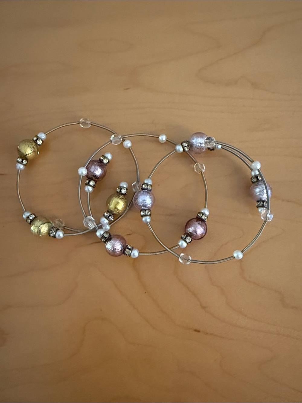Stackable Women's Beaded Hoop Bracelets in Gold, Purple, and Pink